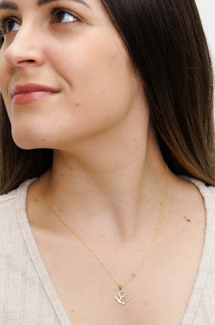 HERSHE, 14 Karat Gold Flower Heart Pendant Necklace.