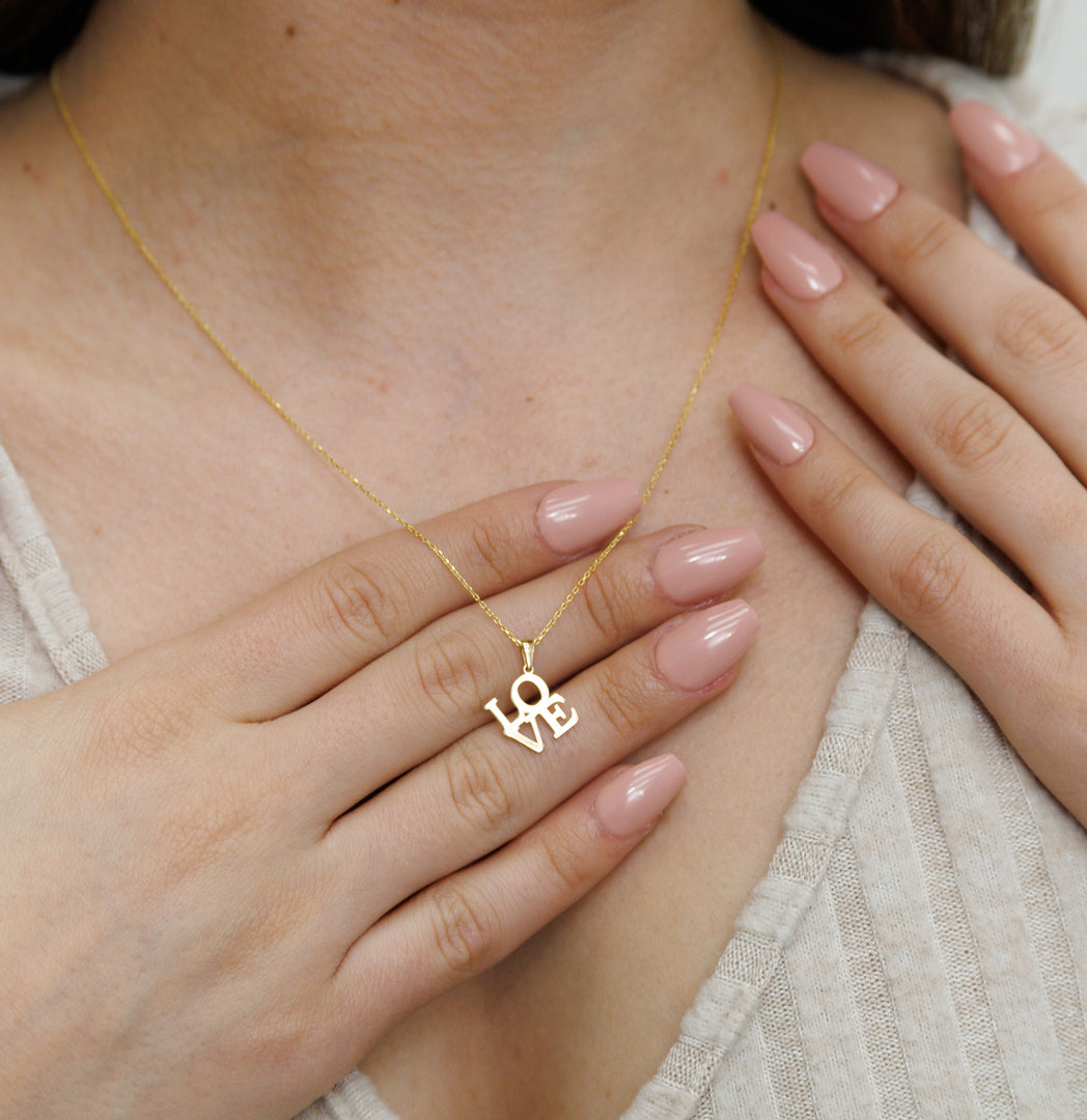 HERSHE, 14 Karat Gold Flower Heart Pendant Necklace.