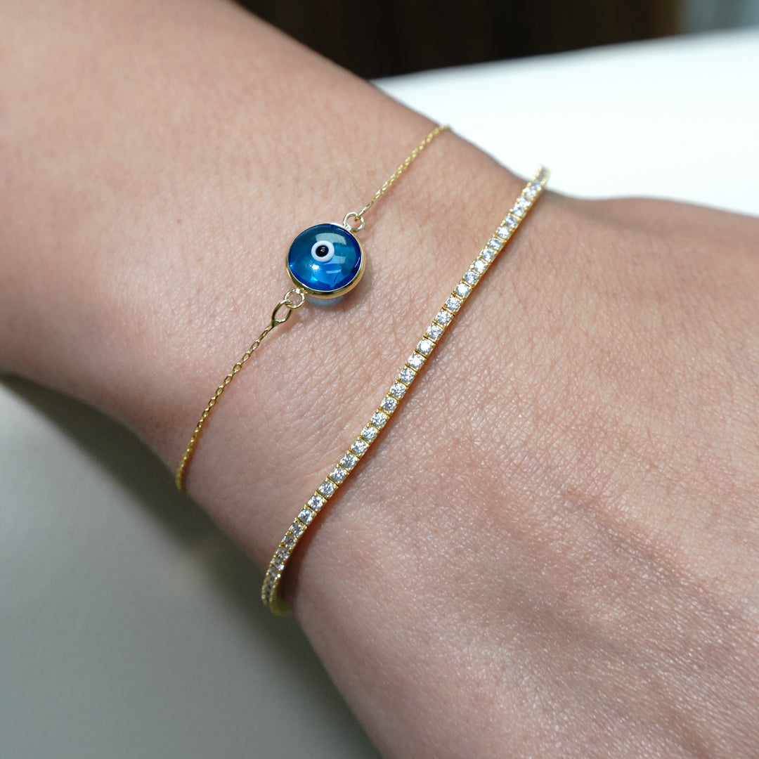 HERSHE, 14 Karat Gold Light Blue Evil Eye Bracelet .