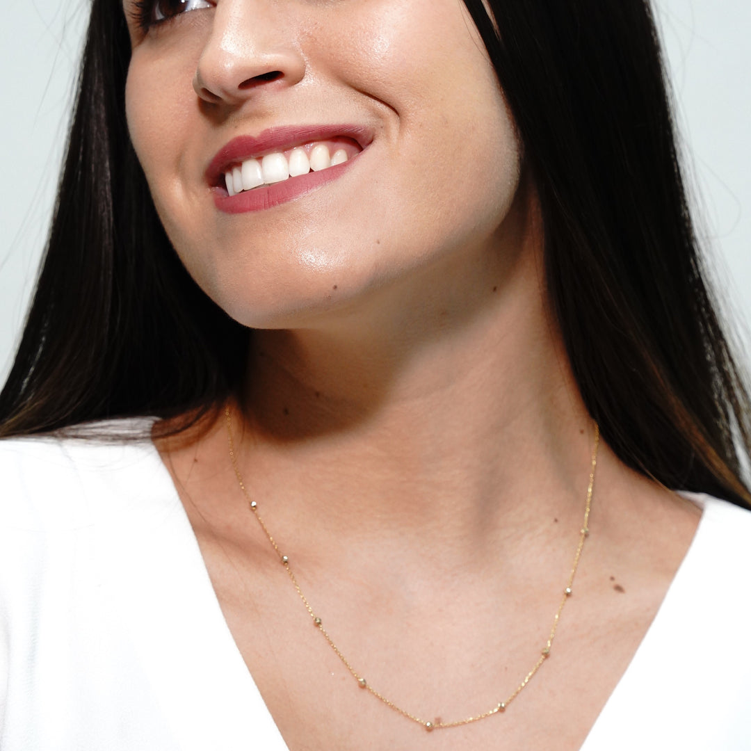 HERSHE, 14 Karat Gold Ball Station Necklace.