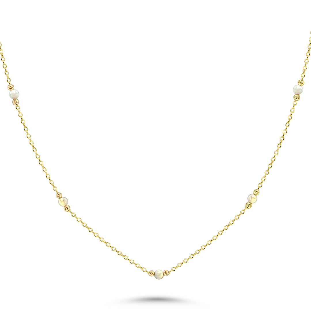 HERSHE, White Opal Bead Station Necklace in 14 Karat Gold.