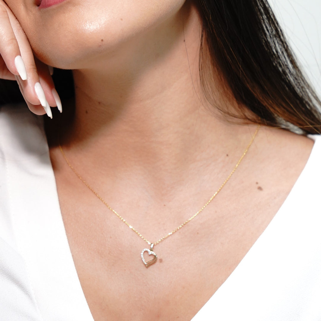 HERSHE, 14 Karat Gold Heart Necklace with CZ .