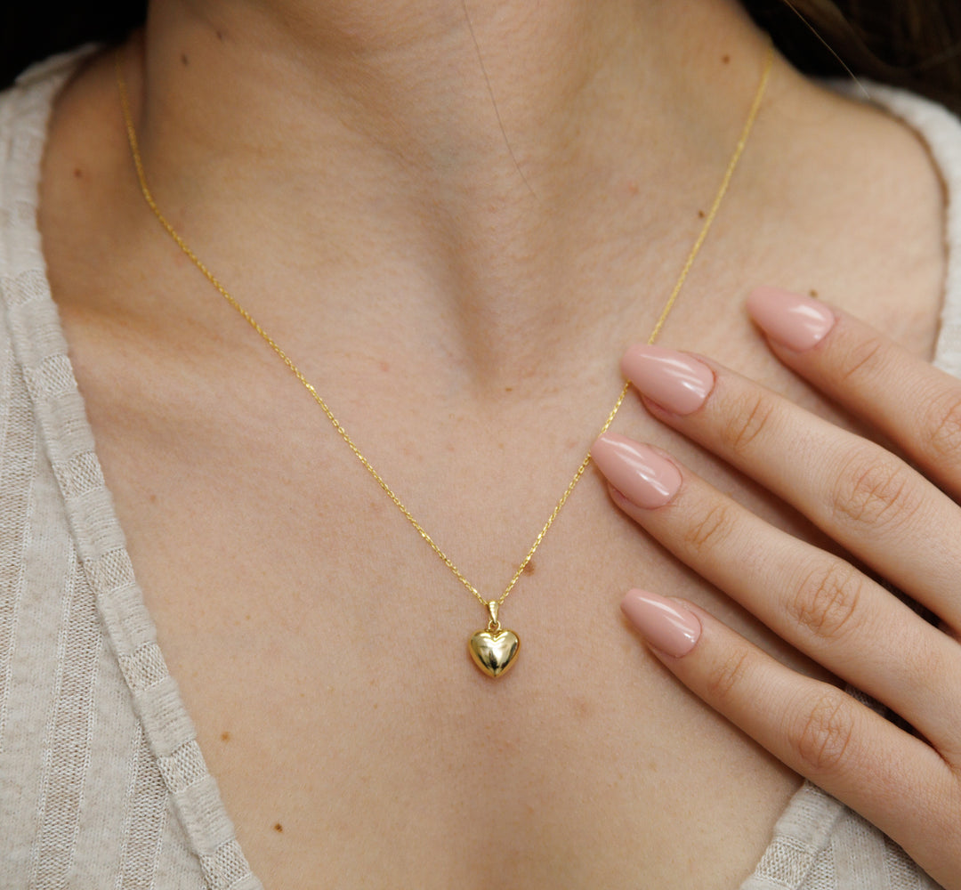 HERSHE, 14 Karat Gold Puffed Heart Pendant Necklace.