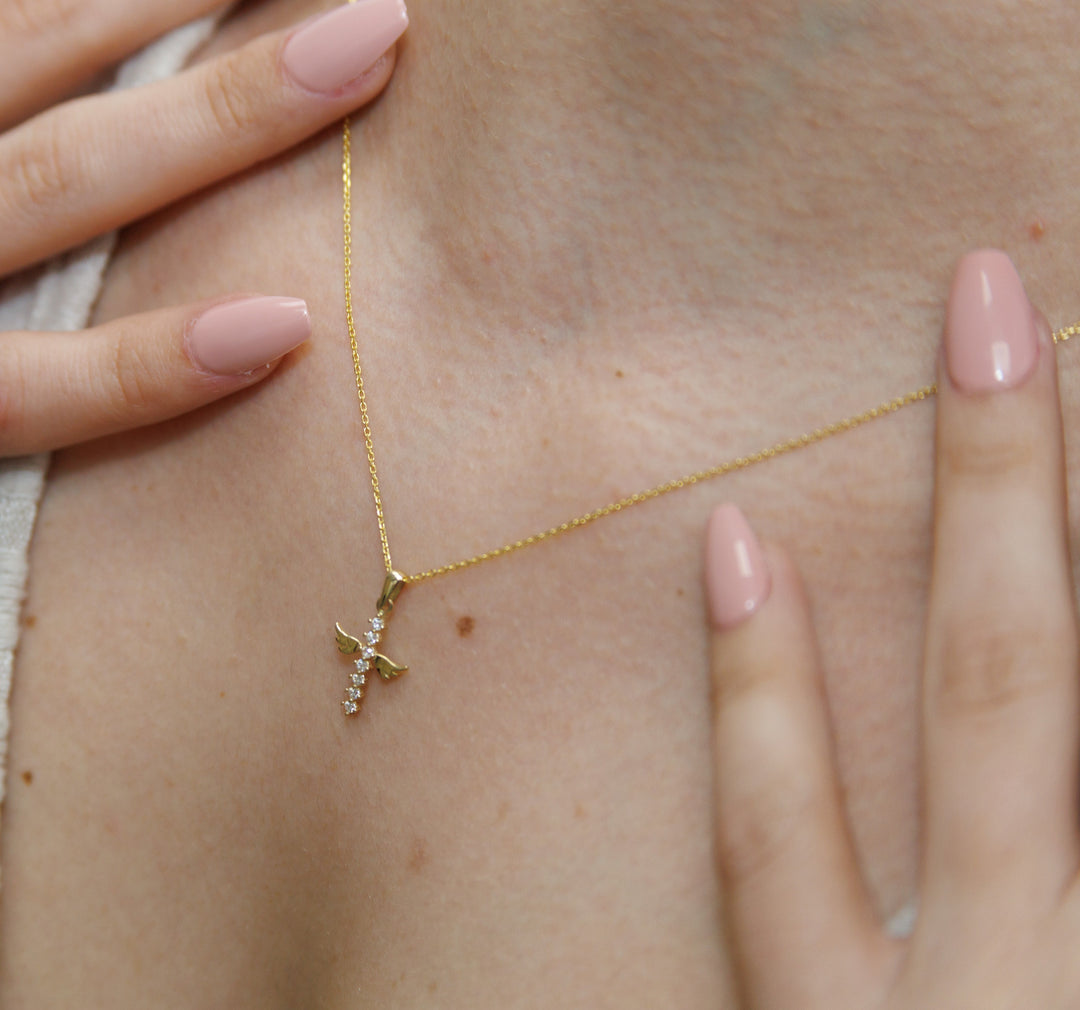 HERSHE, Angel Cross Pendant Necklace in 14 Karat Gold.