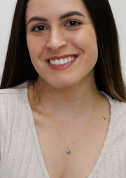 HERSHE, 14 Karat Gold Blue Evil Eye Necklace.