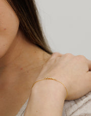 HERSHE, 14 Karat Three Stone CZ Bracelet.