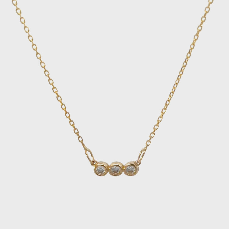 HERSHE ,14 Karat Gold Three Stone Necklace with CZ.