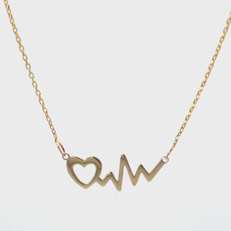 HERSHE, Heartbeat Necklace in 14 Karat Solid Gold.