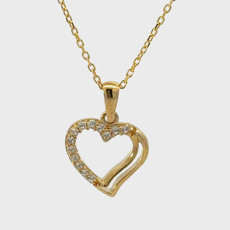 HERSHE, 14 Karat Gold Heart Necklace with CZ.